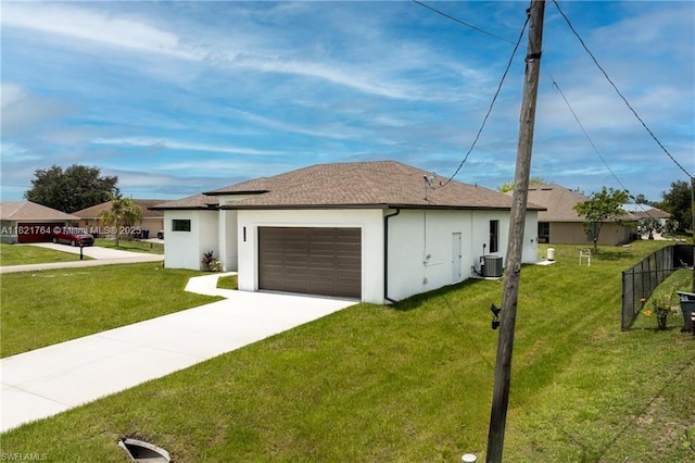 1003 Casino Ave, Lehigh Acres, FL 33971 - view of home's exterior with an attached garage, stucco siding, driveway, and roof with shingles
