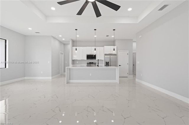 1003 Casino Ave, Lehigh Acres, FL 33971 - unfurnished living room with a tray ceiling, a ceiling fan, recessed lighting, and light marble finish floors