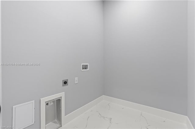 1003 Casino Ave, Lehigh Acres, FL 33971 - washroom featuring electric dryer hookup, marble look tiles, and hookup for a washing machine