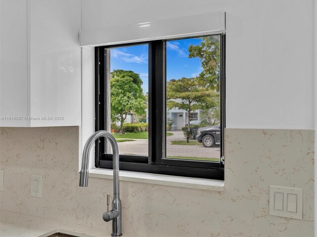 107 Central Ave, Delray Beach, FL 33483 - kitchen view of light stone countertops and decorative backsplash