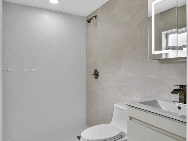 107 Central Ave, Delray Beach, FL 33483 - bathroom with vanity, tiled shower, tile walls, and recessed lighting