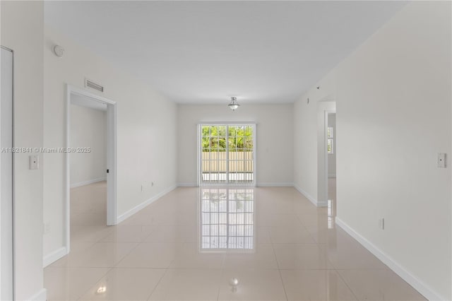 5271 SW 8th St Unit 213, Miami, FL 33134 - spare room featuring light tile patterned floors