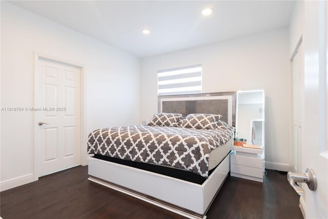 8885 NW 100th Pl, Doral, FL 33178 - bedroom with dark wood-type flooring and recessed lighting