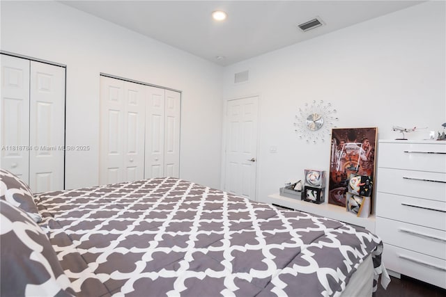 8885 NW 100th Pl, Doral, FL 33178 - bedroom featuring two closets and recessed lighting