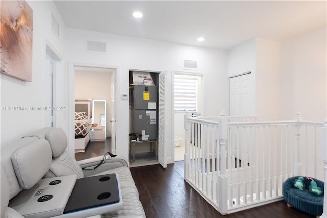 8885 NW 100th Pl, Doral, FL 33178 - office area featuring dark wood-style floors, recessed lighting, and heating unit