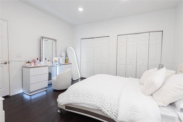 8885 NW 100th Pl, Doral, FL 33178 - bedroom with multiple closets, dark wood finished floors, and recessed lighting