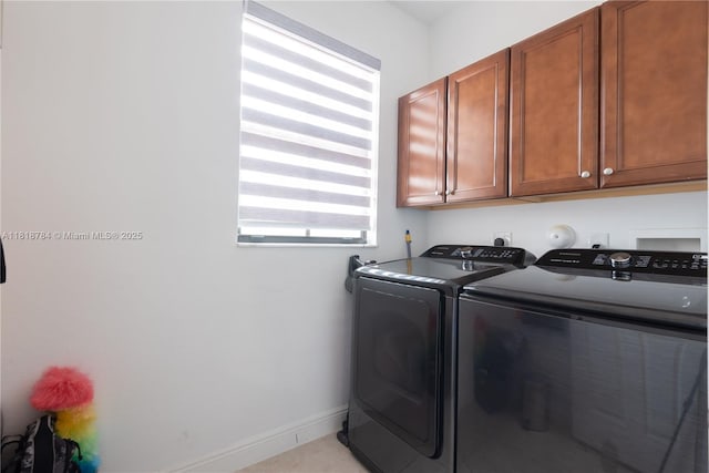 8885 NW 100th Pl, Doral, FL 33178 - laundry area with separate washer and dryer and cabinet space