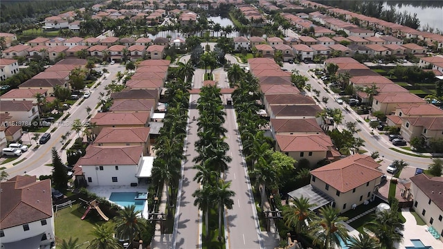 8885 NW 100th Pl, Doral, FL 33178 - aerial perspective of suburban area with a large body of water and a pool area