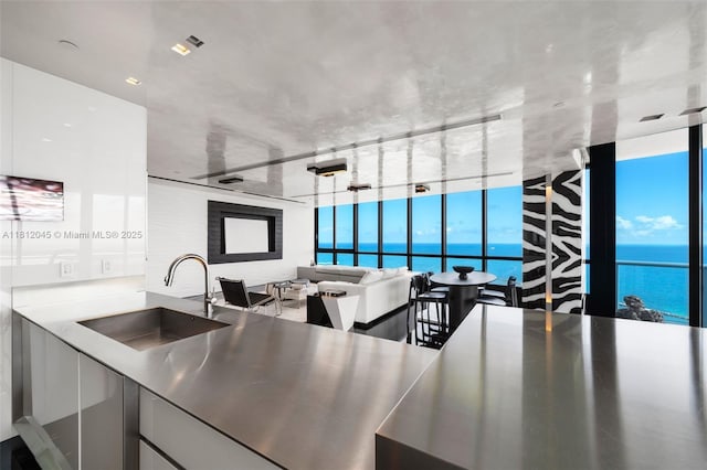 100 S Pointe Dr Unit 3003, Miami Beach, FL 33139 - kitchen with modern cabinets and a water view