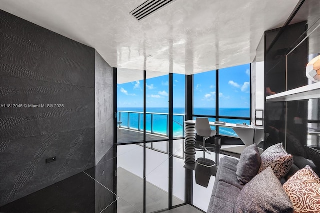 100 S Pointe Dr Unit 3003, Miami Beach, FL 33139 - living room featuring a water view and expansive windows