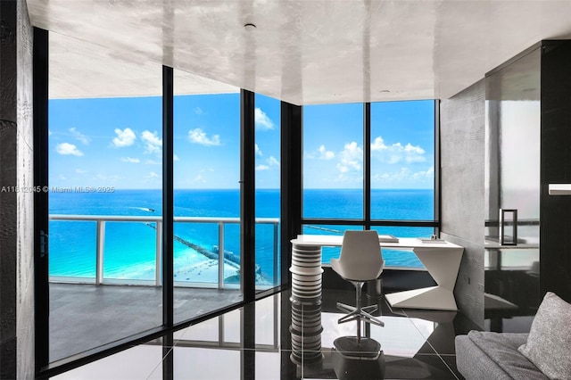 100 S Pointe Dr Unit 3003, Miami Beach, FL 33139 - home office with a water view, a wall of windows, and tile patterned flooring