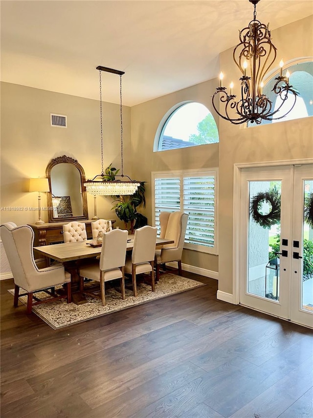 4370 NW 62nd Ter, Coral Springs, FL 33067 - dining space featuring dark wood-type flooring and a chandelier