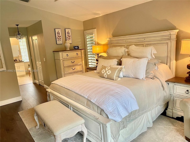 4370 NW 62nd Ter, Coral Springs, FL 33067 - bedroom featuring hardwood / wood-style flooring and connected bathroom