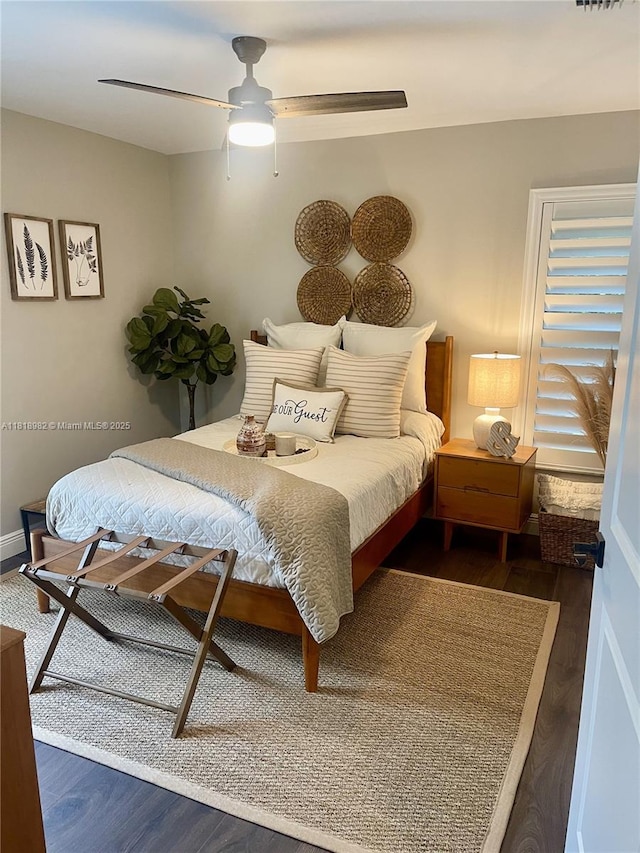 4370 NW 62nd Ter, Coral Springs, FL 33067 - bedroom with wood finished floors and ceiling fan