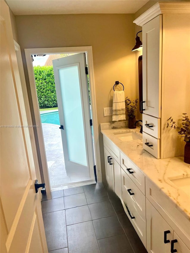 4370 NW 62nd Ter, Coral Springs, FL 33067 - bathroom with double vanity and tile patterned floors