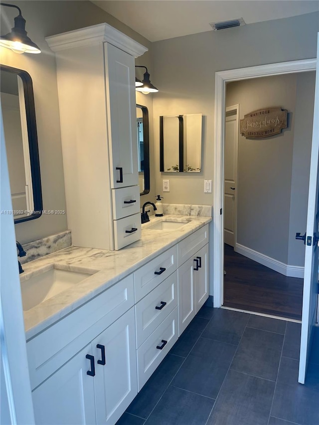 4370 NW 62nd Ter, Coral Springs, FL 33067 - full bathroom featuring double vanity and tile patterned floors