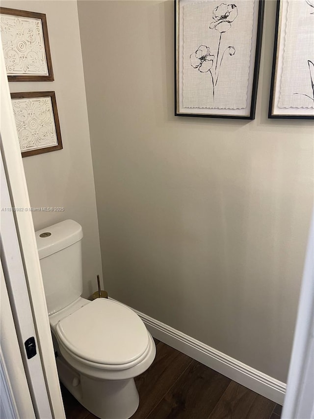 4370 NW 62nd Ter, Coral Springs, FL 33067 - bathroom with wood finished floors and toilet