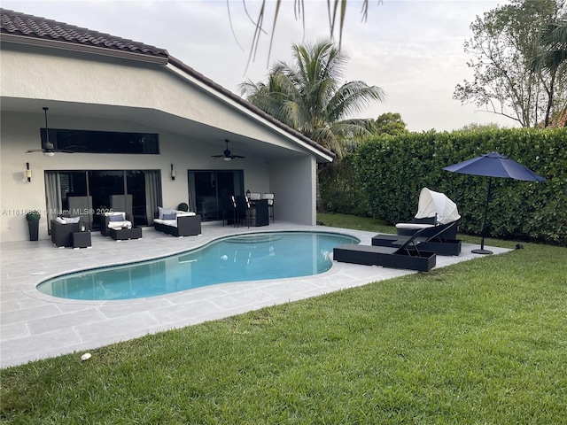 4370 NW 62nd Ter, Coral Springs, FL 33067 - view of pool with a ceiling fan, an outdoor living space, a yard, a patio, and a grill