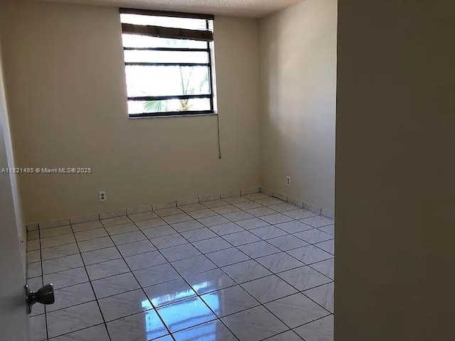 546 SW 1st St Unit 501, Miami, FL 33130 - unfurnished room featuring light tile patterned floors