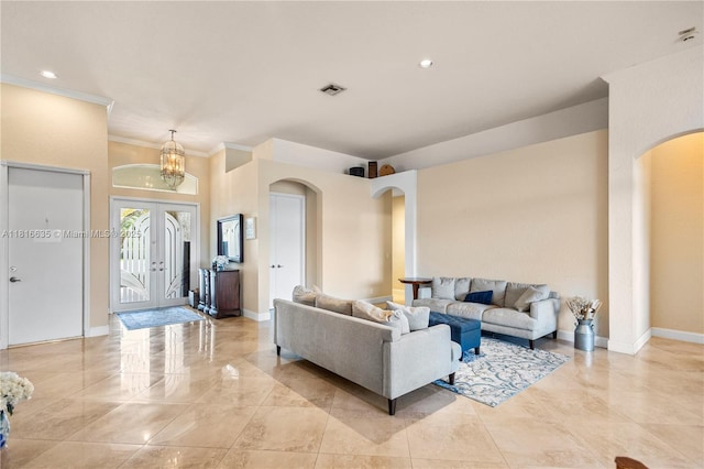 11196 Sea Grass Cir, Boca Raton, FL 33498 - living area featuring arched walkways, french doors, a chandelier, crown molding, and recessed lighting