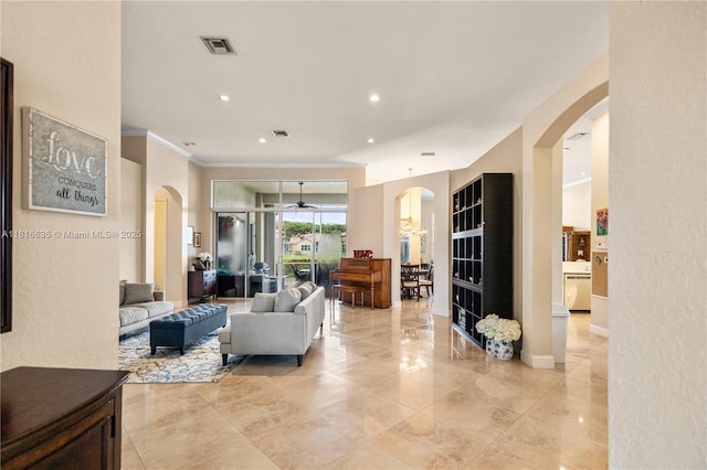 11196 Sea Grass Cir, Boca Raton, FL 33498 - living area with arched walkways, a ceiling fan, crown molding, and recessed lighting
