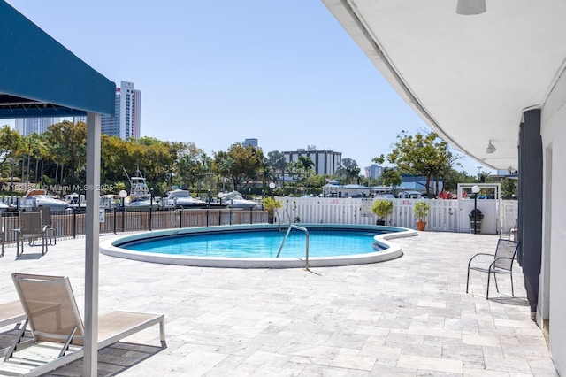 400 Diplomat Pkwy Unit 302, Hallandale Beach, FL 33009 - community pool featuring a patio
