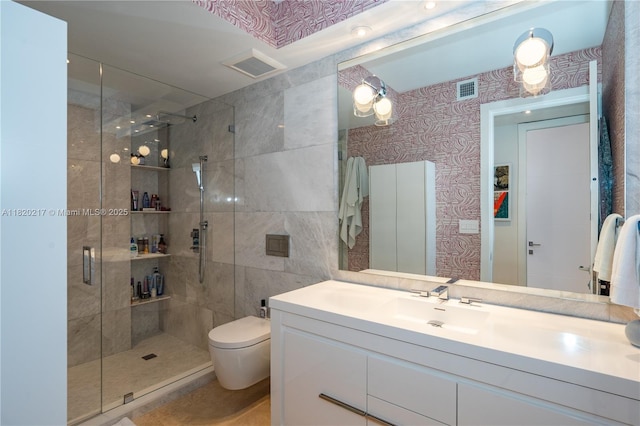 901 Brickell Key Blvd Unit 2602, Miami, FL 33131 - bathroom with a stall shower, vanity, and wallpapered walls