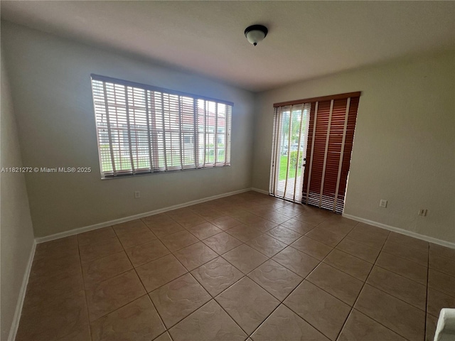 2614 SW 188th Ave, Miramar, FL 33029 - spare room with tile patterned flooring and baseboards