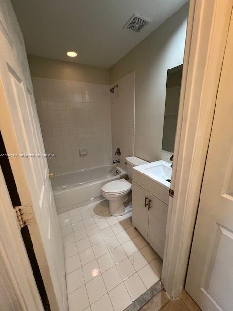2614 SW 188th Ave, Miramar, FL 33029 - bathroom featuring tile patterned floors, vanity,  shower combination, and recessed lighting
