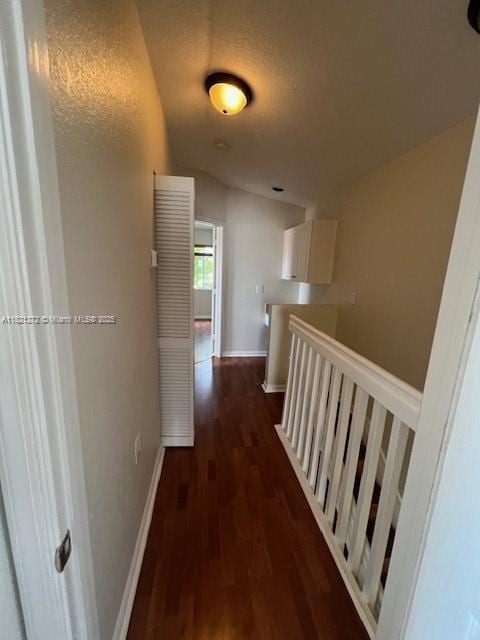 2614 SW 188th Ave, Miramar, FL 33029 - hall with dark wood-style flooring and an upstairs landing