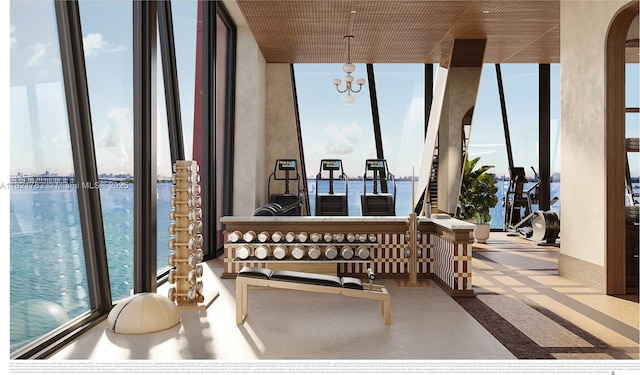 710 NE 29th St Unit 3002, Miami, FL 33137 - sunroom with a water view, arched walkways, and a chandelier