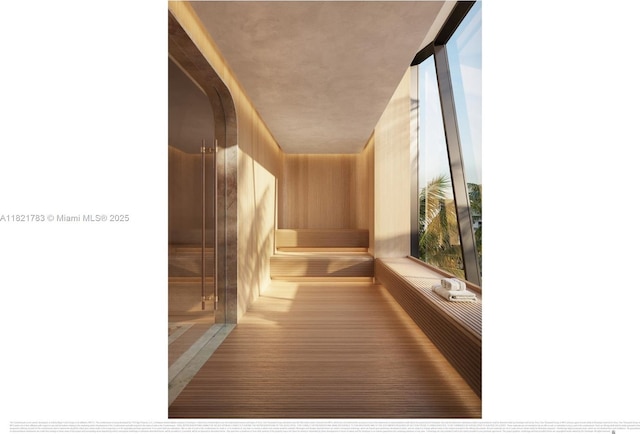 710 NE 29th St Unit 3002, Miami, FL 33137 - hallway featuring wood finished floors and arched walkways
