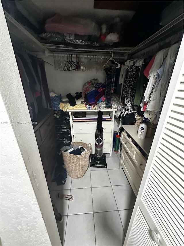 7535 W 5th Ct, Hialeah, FL 33014 - spacious closet with light tile patterned floors