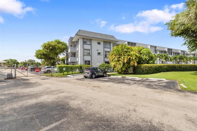 6705 NW 169th St Unit C310, Hialeah, FL 33015 - view of property with uncovered parking