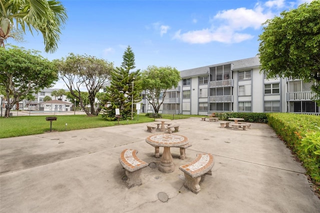 6705 NW 169th St Unit C310, Hialeah, FL 33015 - surrounding community with a lawn