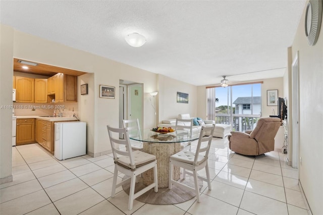 6705 NW 169th St Unit C310, Hialeah, FL 33015 - dining space featuring light tile patterned flooring