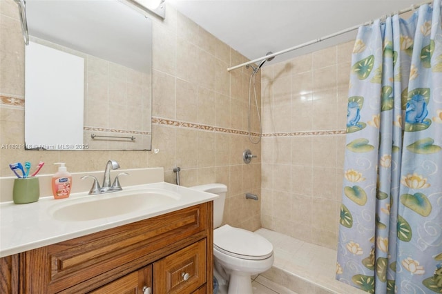 6705 NW 169th St Unit C310, Hialeah, FL 33015 - full bathroom featuring vanity, a tile shower, and tile walls