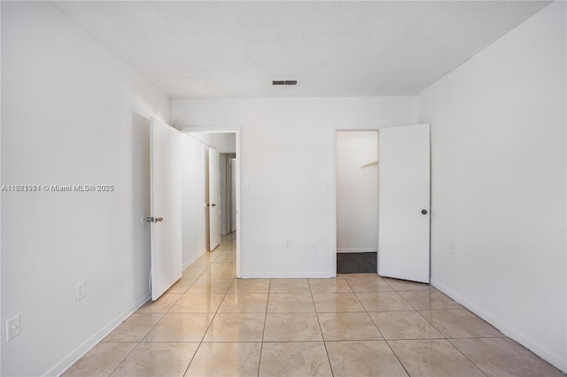 2203 SW 80th Ter Unit 2203, Miramar, FL 33025 - unfurnished bedroom with light tile patterned floors and baseboards