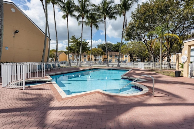 2203 SW 80th Ter Unit 2203, Miramar, FL 33025 - view of pool with a patio and a pool with connected hot tub