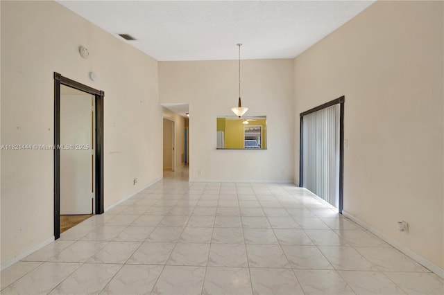 1798 Maplewood Trl, Coconut Creek, FL 33063 - spare room with high vaulted ceiling and a smoke detector