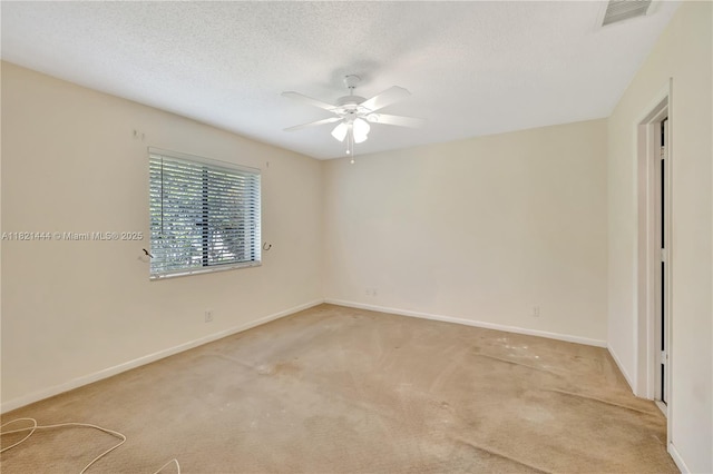 1798 Maplewood Trl, Coconut Creek, FL 33063 - unfurnished room with light carpet, ceiling fan, and a textured ceiling