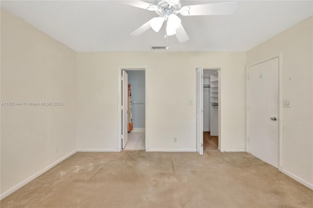 1798 Maplewood Trl, Coconut Creek, FL 33063 - unfurnished bedroom with carpet flooring, a spacious closet, a closet, and ceiling fan