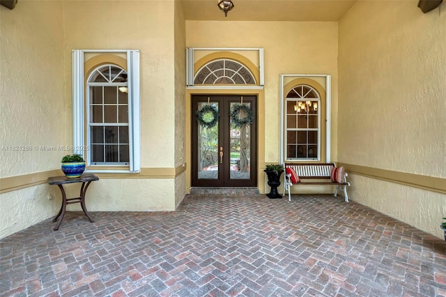 1925 NW 167th Ter, Pembroke Pines, FL 33028 - doorway to property featuring french doors and stucco siding