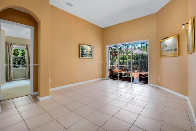 1925 NW 167th Ter, Pembroke Pines, FL 33028 - empty room featuring light tile patterned floors and arched walkways