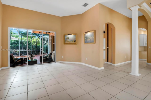 1925 NW 167th Ter, Pembroke Pines, FL 33028 - spare room featuring arched walkways, light tile patterned floors, and ornate columns