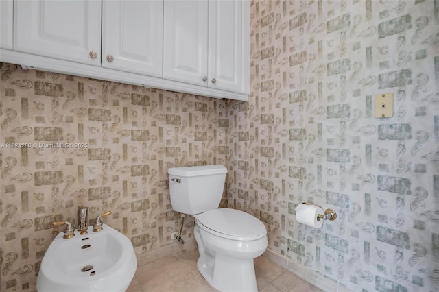 1925 NW 167th Ter, Pembroke Pines, FL 33028 - bathroom featuring a bidet, wallpapered walls, and tile patterned floors