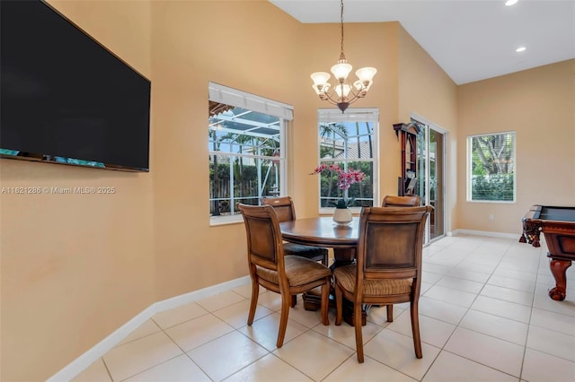 1925 NW 167th Ter, Pembroke Pines, FL 33028 - dining room featuring a chandelier, recessed lighting, light tile patterned floors, and a high ceiling