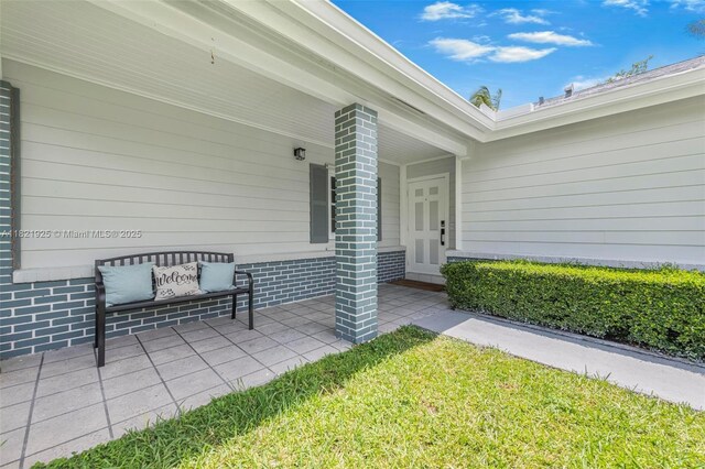 14821 SW 148th St Cir, Miami, FL 33196 - view of exterior entry featuring covered porch
