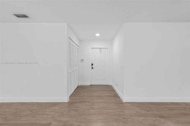 14821 SW 148th St Cir, Miami, FL 33196 - hall featuring light wood-style floors and recessed lighting