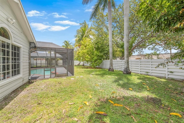14821 SW 148th St Cir, Miami, FL 33196 - fenced backyard featuring an outdoor pool and glass enclosure